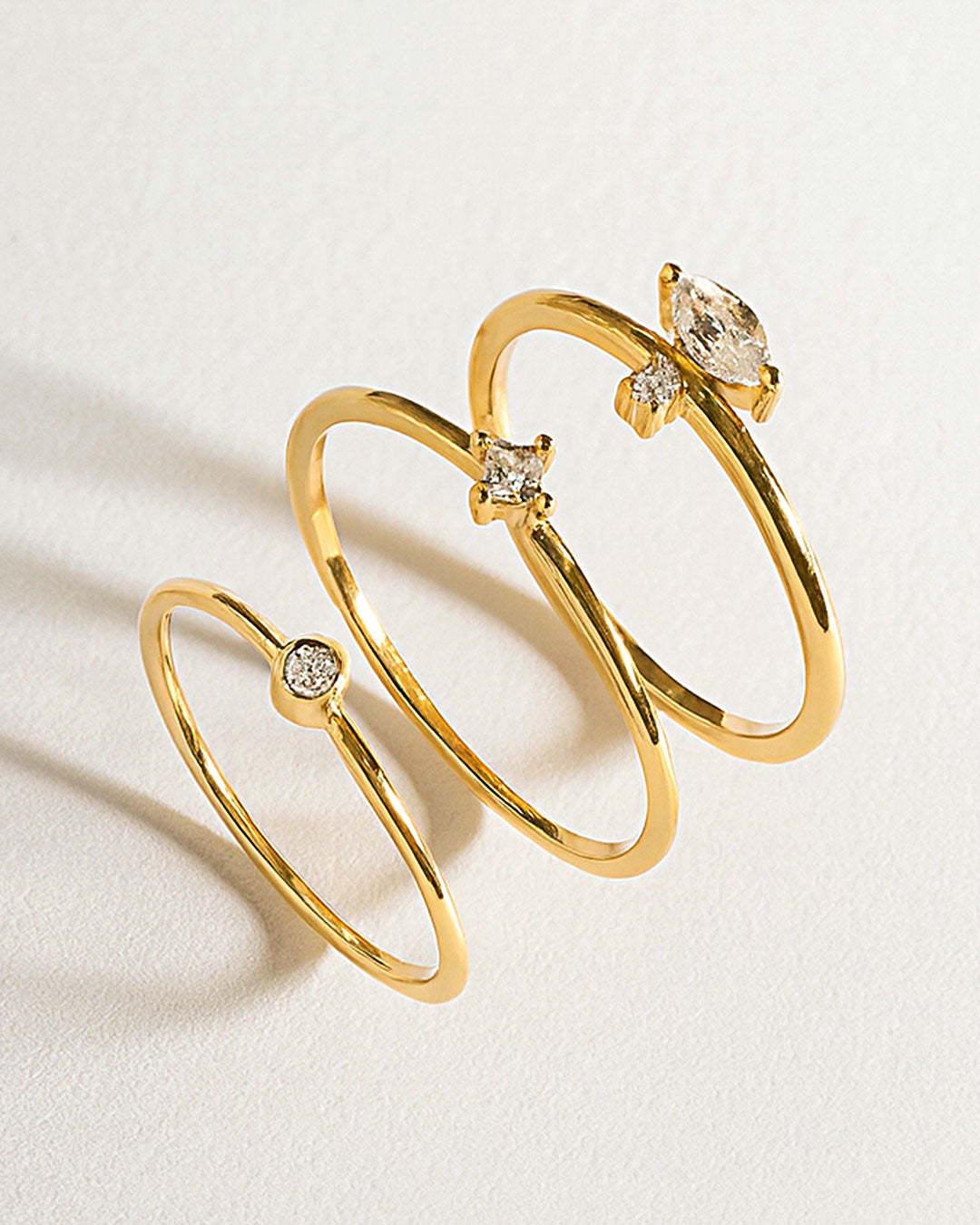 Set of gold rings with crystals in minimalist designs – shop stacking rings for modern everyday jewelry.