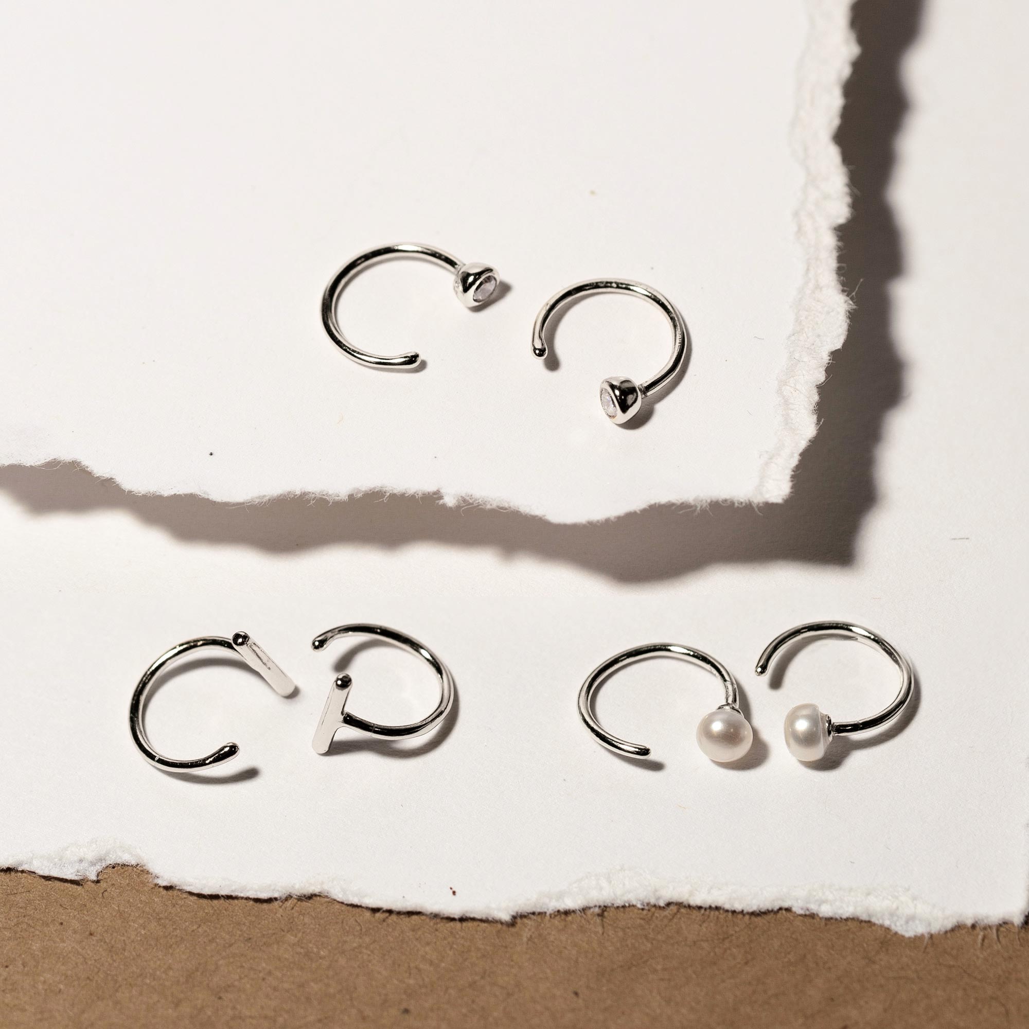 Tiny Solitaire Huggie Earrings