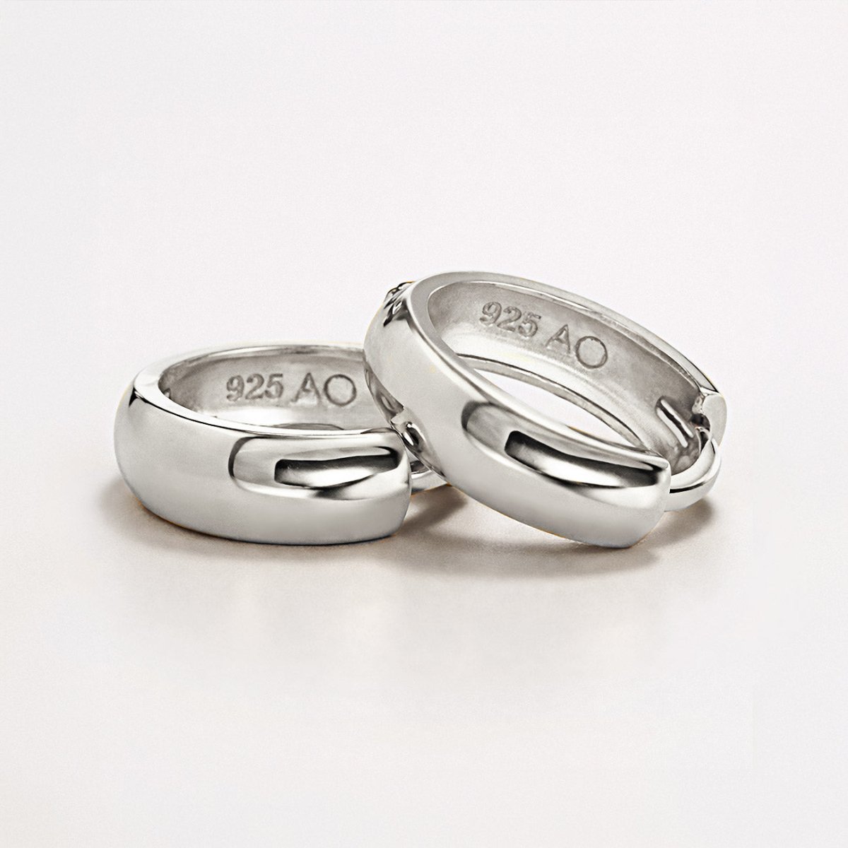 Detailed shot of AMYO's Boyfriend huggies in sterling silver