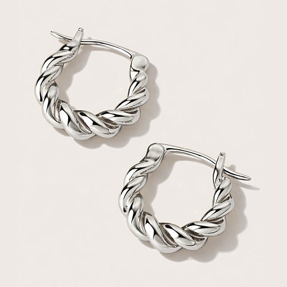 Detailed shot of the Mini Thick Twisted Hoops in Sterling Silver.