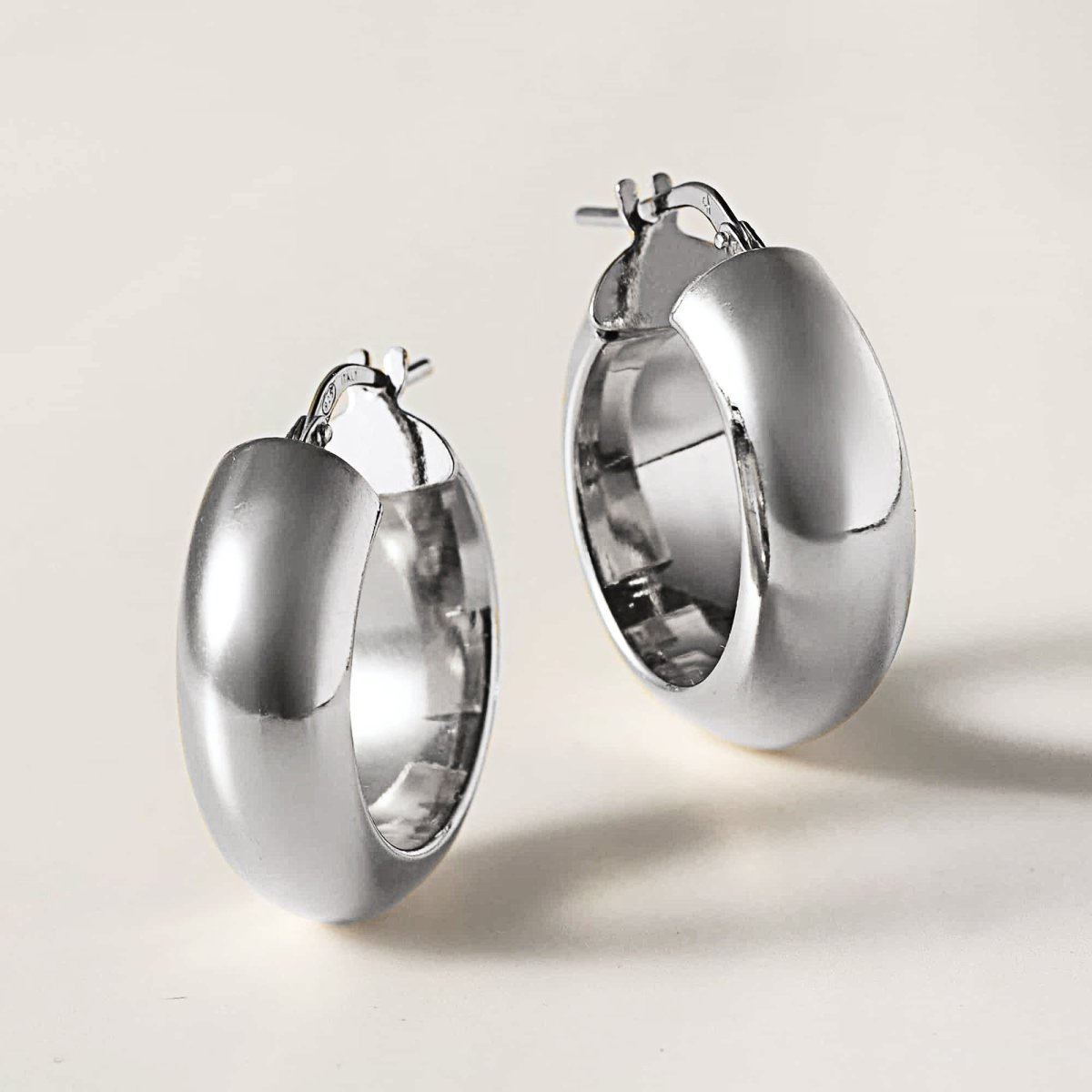 Pair of bold chunky sterling silver hoop earrings from AMYO