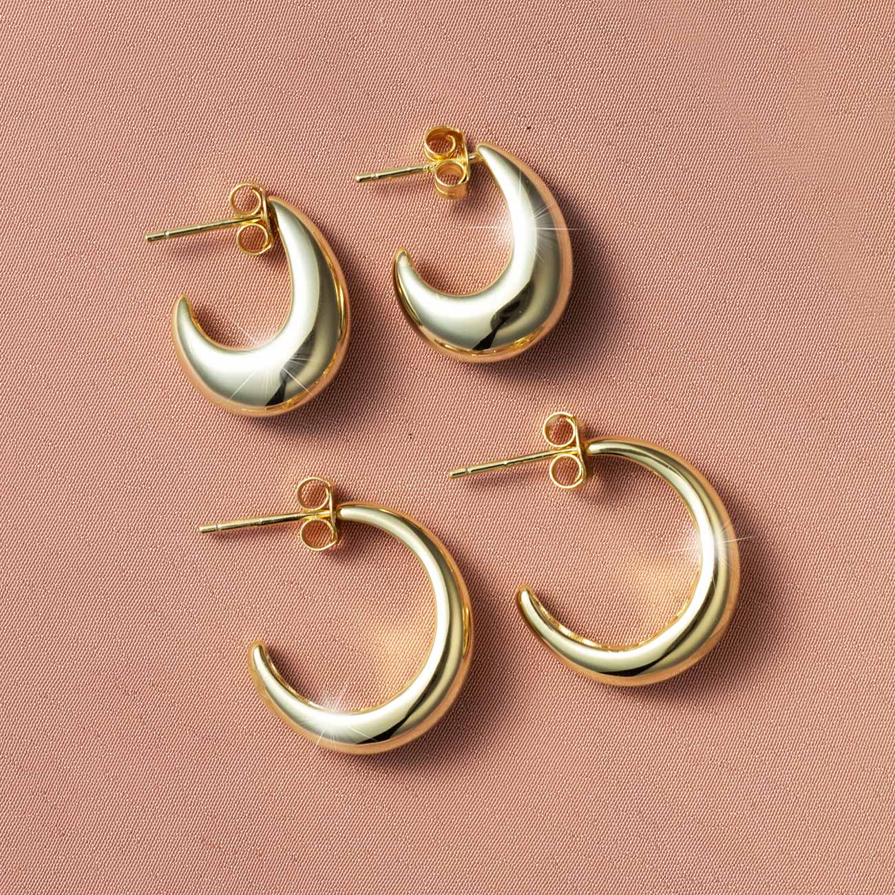 Bold Gold Vermeil Hoops from AMYO on pink background