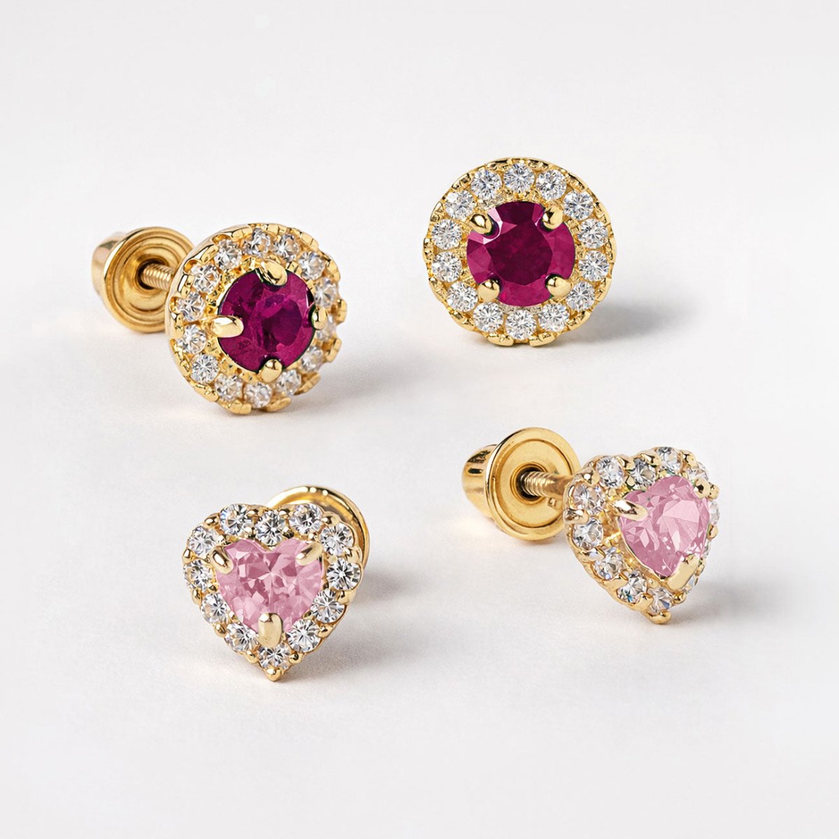14K Gold Heart Gemstone Halo Studs with Pink Sapphire Gemstone and Gemstone Solitaire Halo Studs with Ruby Gemstone from AMYO. | #Gemstone_Ruby