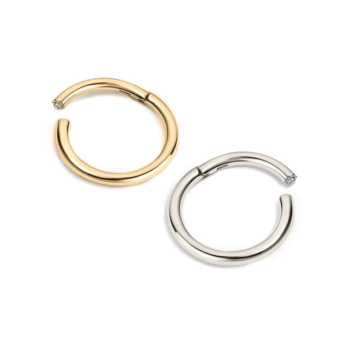 Close-up of Gold vermeil seamless clicker ring and stainless steel seamless clicker ring