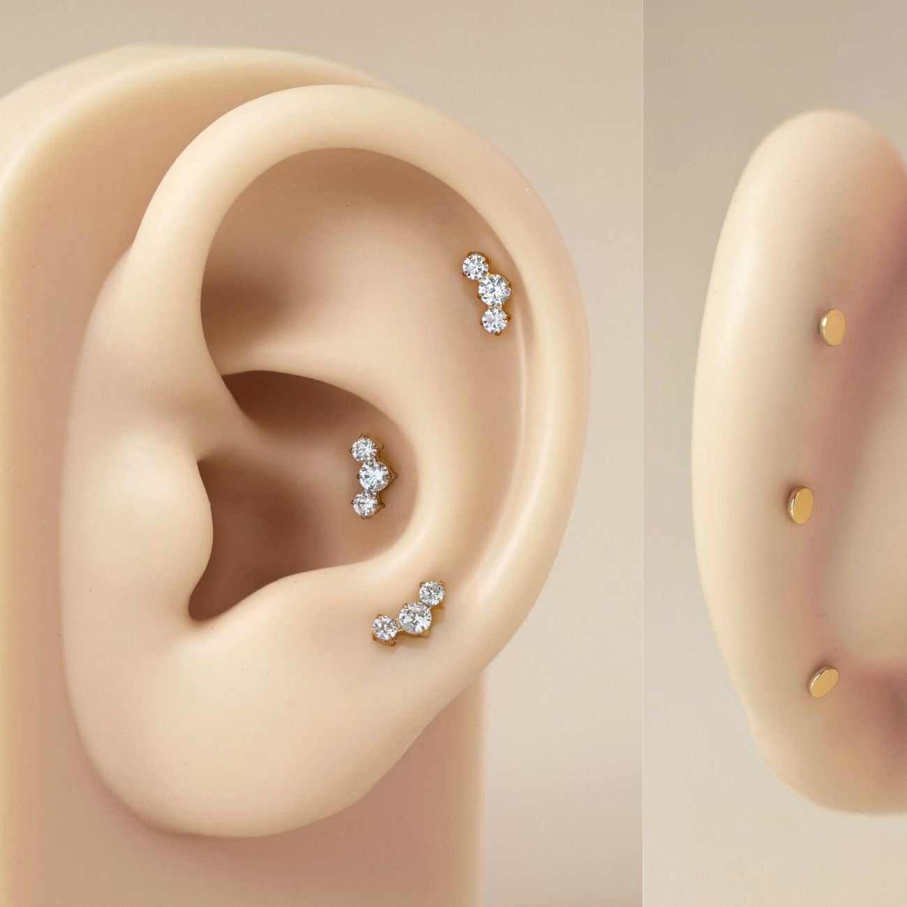 As worn image on silicone ear of Tres Pavé Curve Flat Back Earring in Gold Titanium