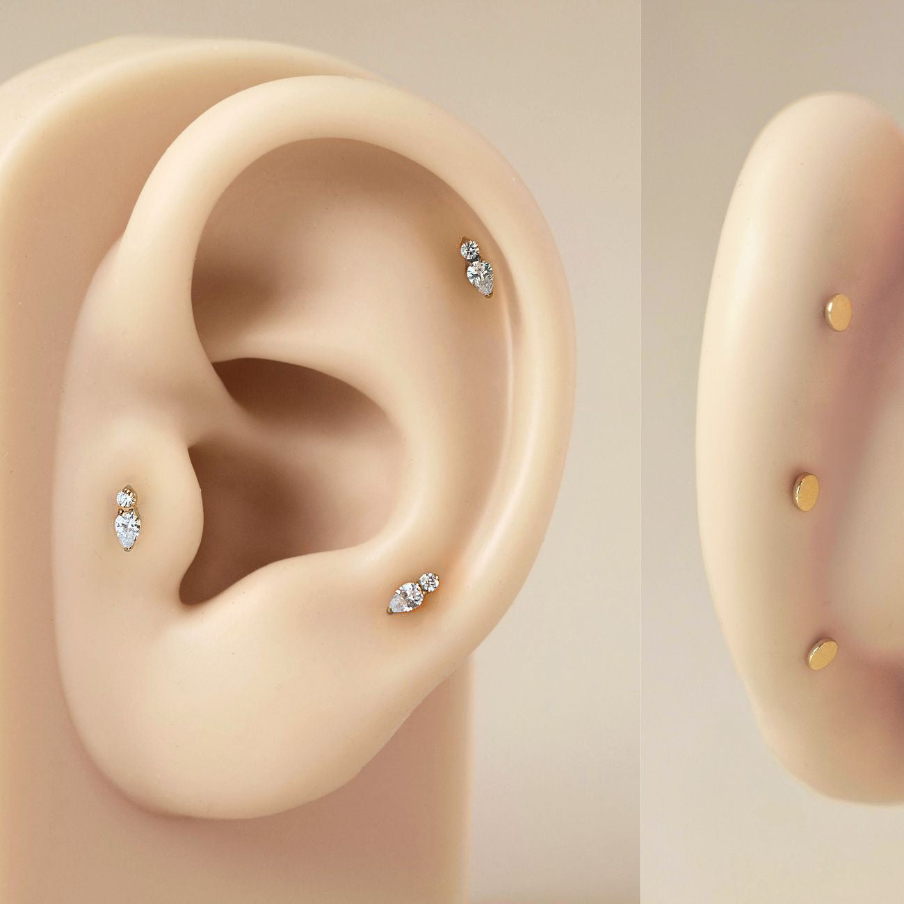 As worn image of Tiny Pear Duo Flatback Stud in Gold Titanium on silicone ear| #Gemstone_White Zirconia