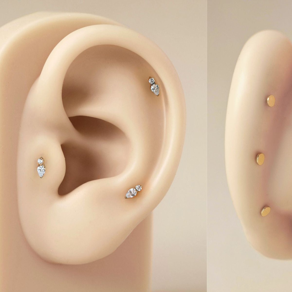 As worn image of Tiny Pear Duo Flatback Stud in Gold Titanium on silicone ear| #Gemstone_White Zirconia
