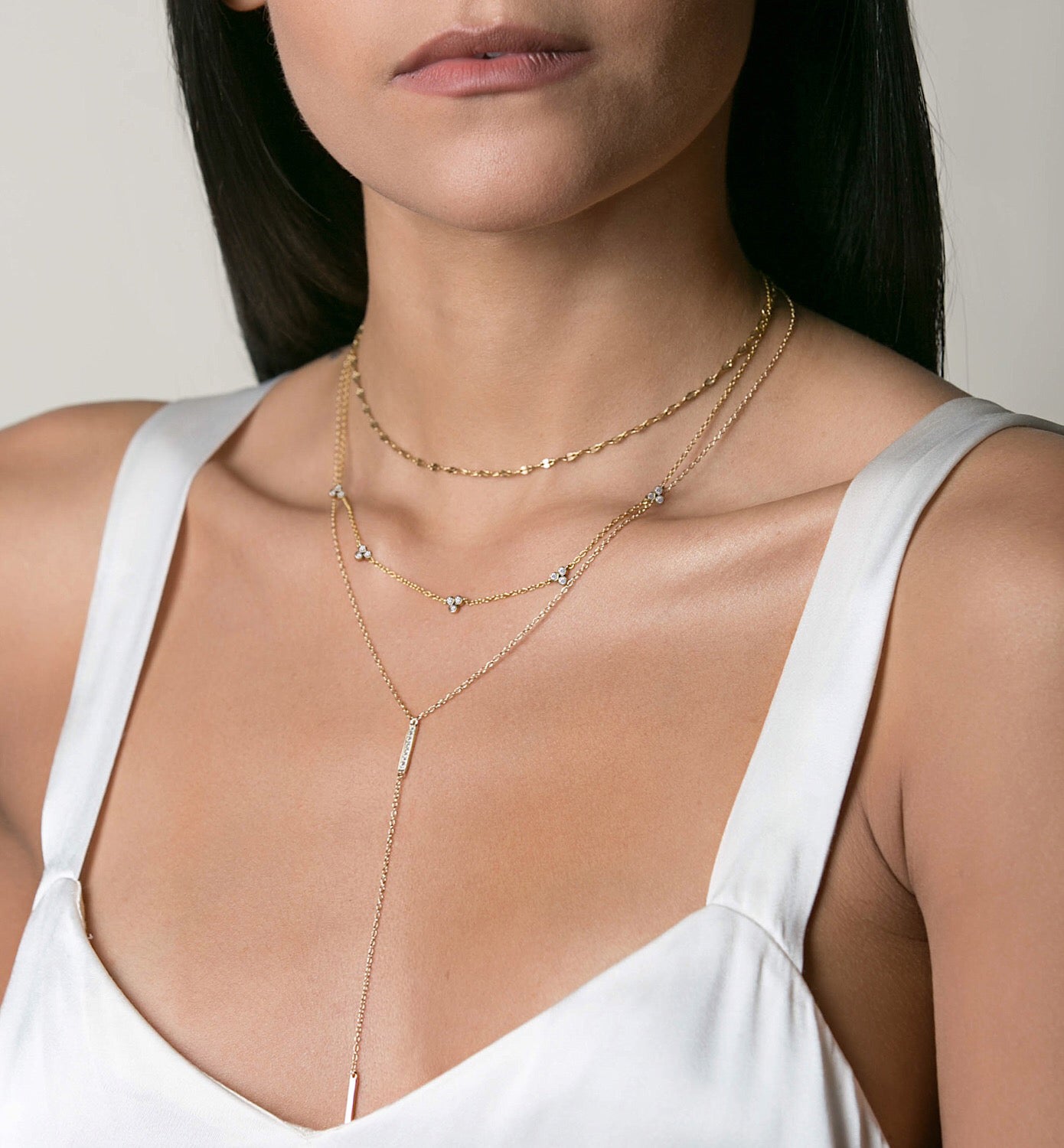 Model wearing Gold Clover Layered Necklace Set