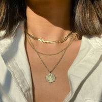 Model wearing 3 Layer Necklace, Cleo Chain Necklace, Figaro Necklace and Gold Grecian Coin Necklace