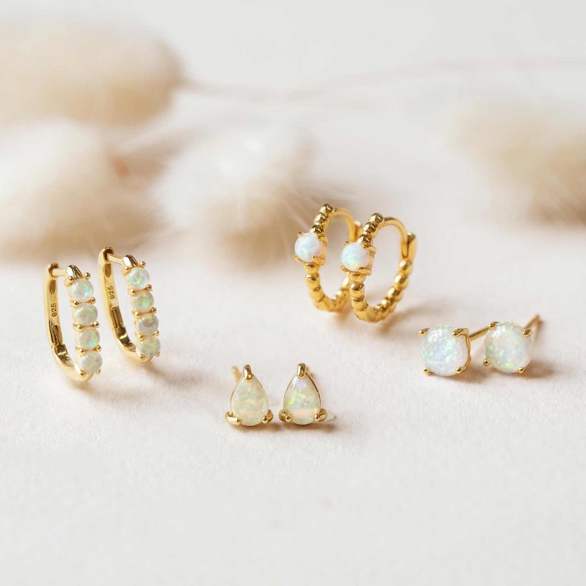 Close-up of the Gold Vermeil Gemstone Bead Opal Earring Collection. 