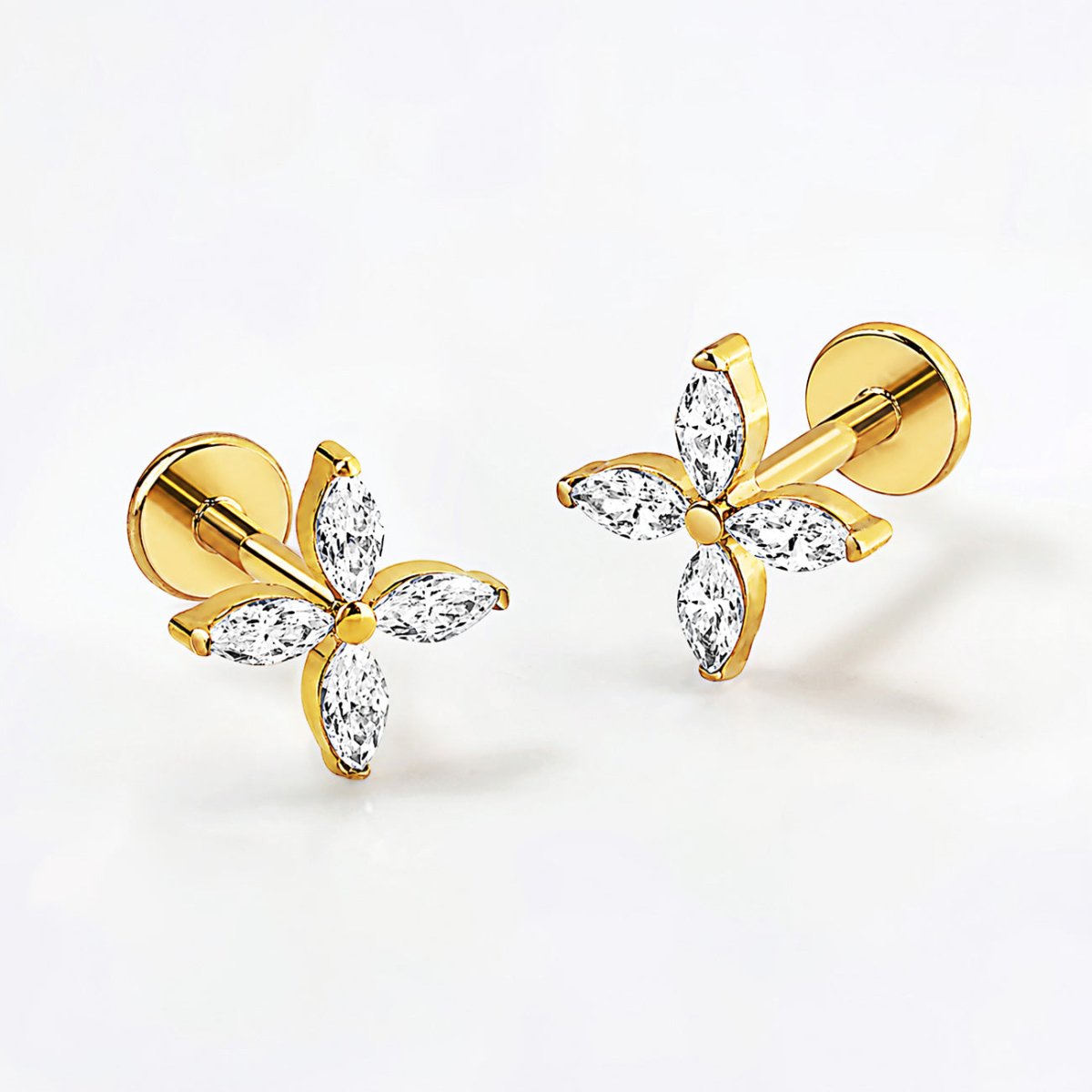 Gold titanium crystal fleur flat back stud earrings, close-up detail