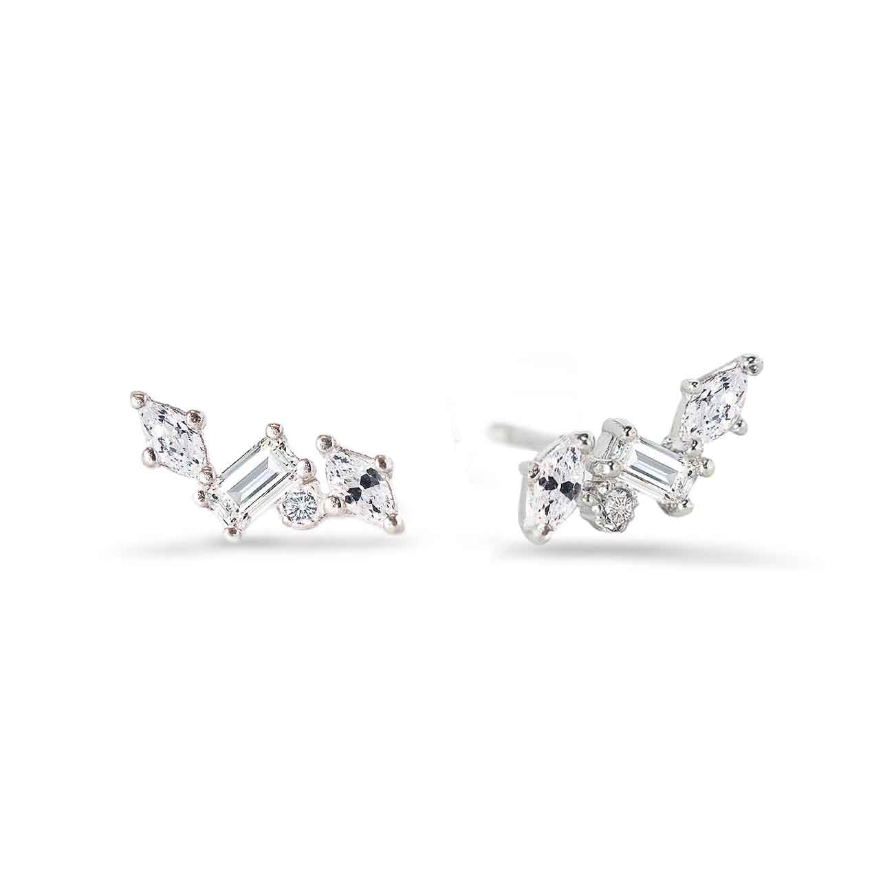 Sterling silver cluster studs with clear marquise, baguette and round stones, on a white background