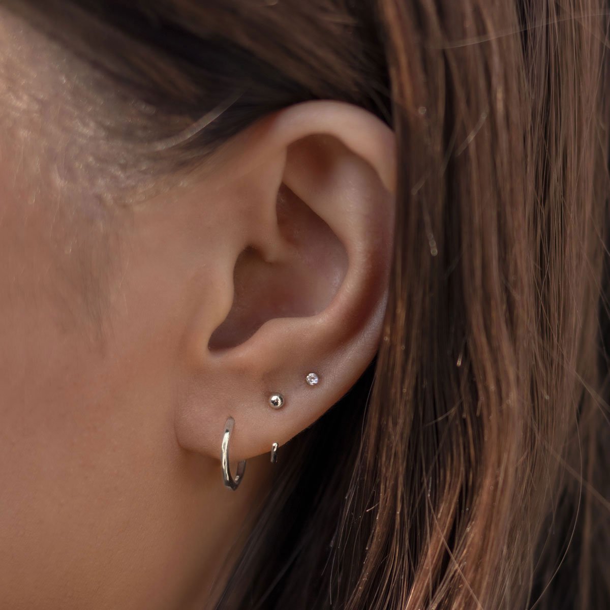 Small Sterling Silver Huggie Earrings with tiny crystal stud