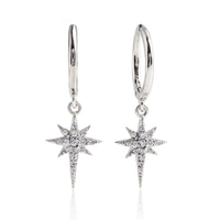 Silver starburst huggie earrings