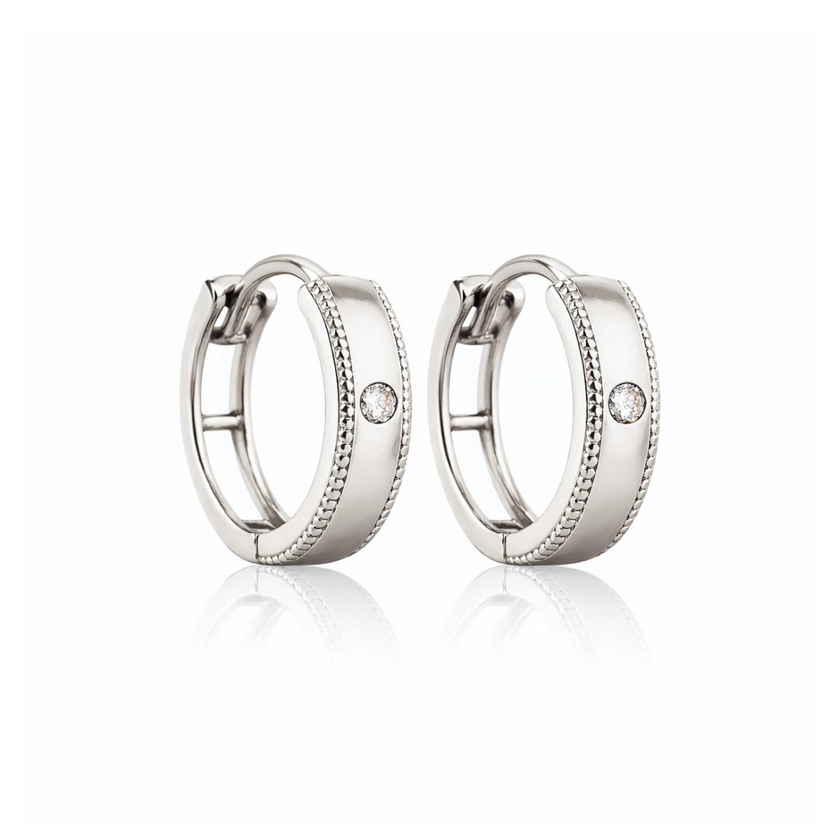 14K white gold milgrain huggie hoops set with a single round diamond, on a white background