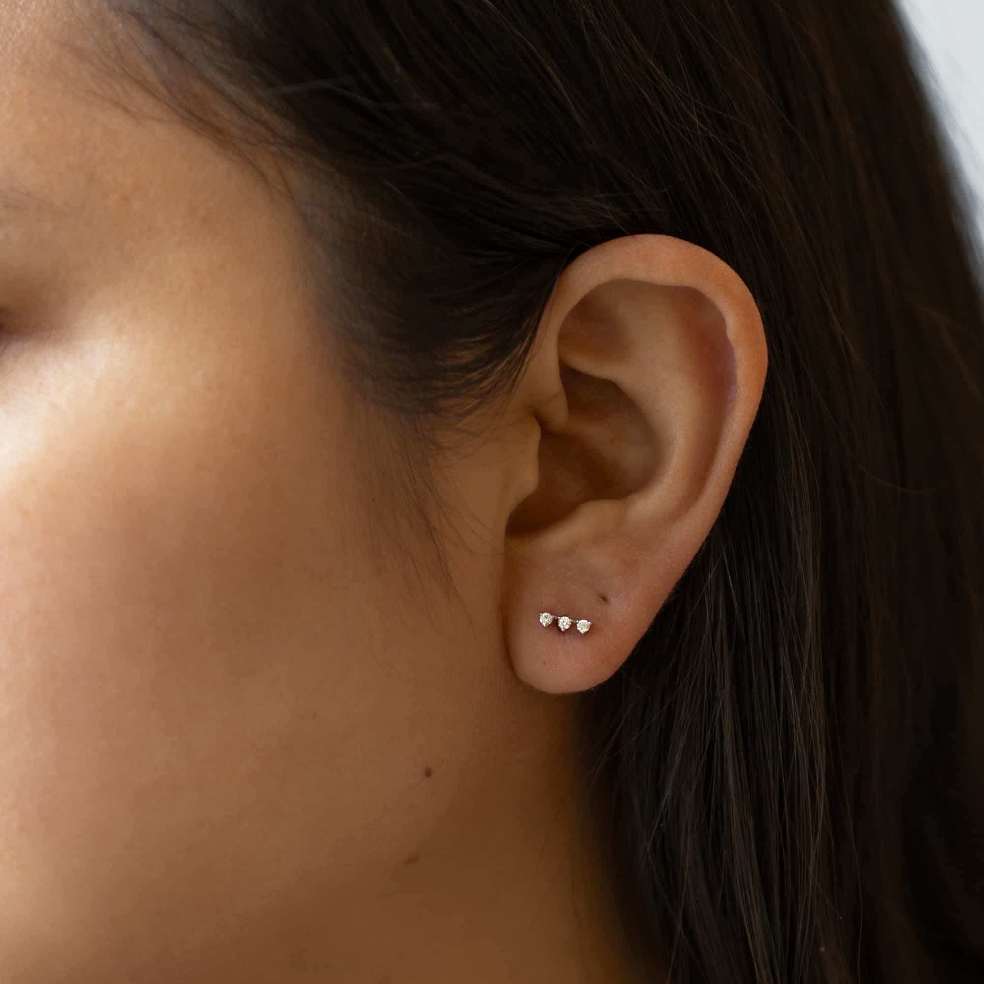 caption:Model has large sized ear lobes