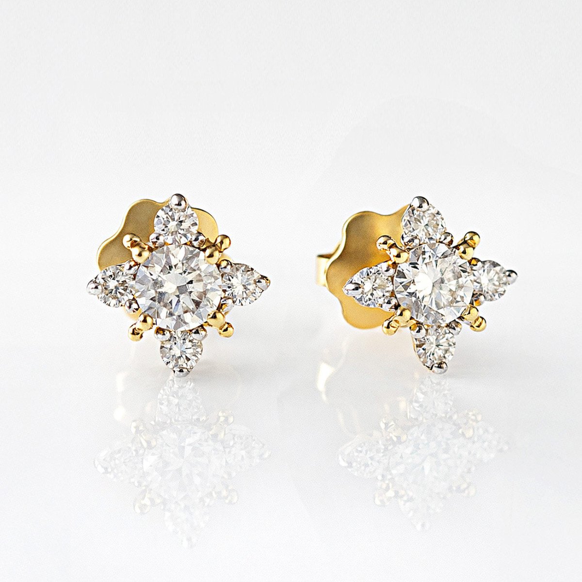 Close up shot of the Diamond Starburst Stud Earrings crafted with 14K Gold and Natural Diamonds from AMYO