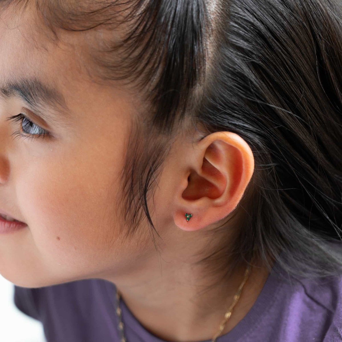 caption:Earrings on 6 year old