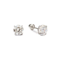 Close-up of earring featuring 14K White Gold White Sapphire Studs