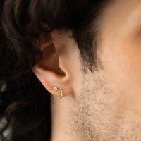 caption: wearing 3mm stud on second hole piercing