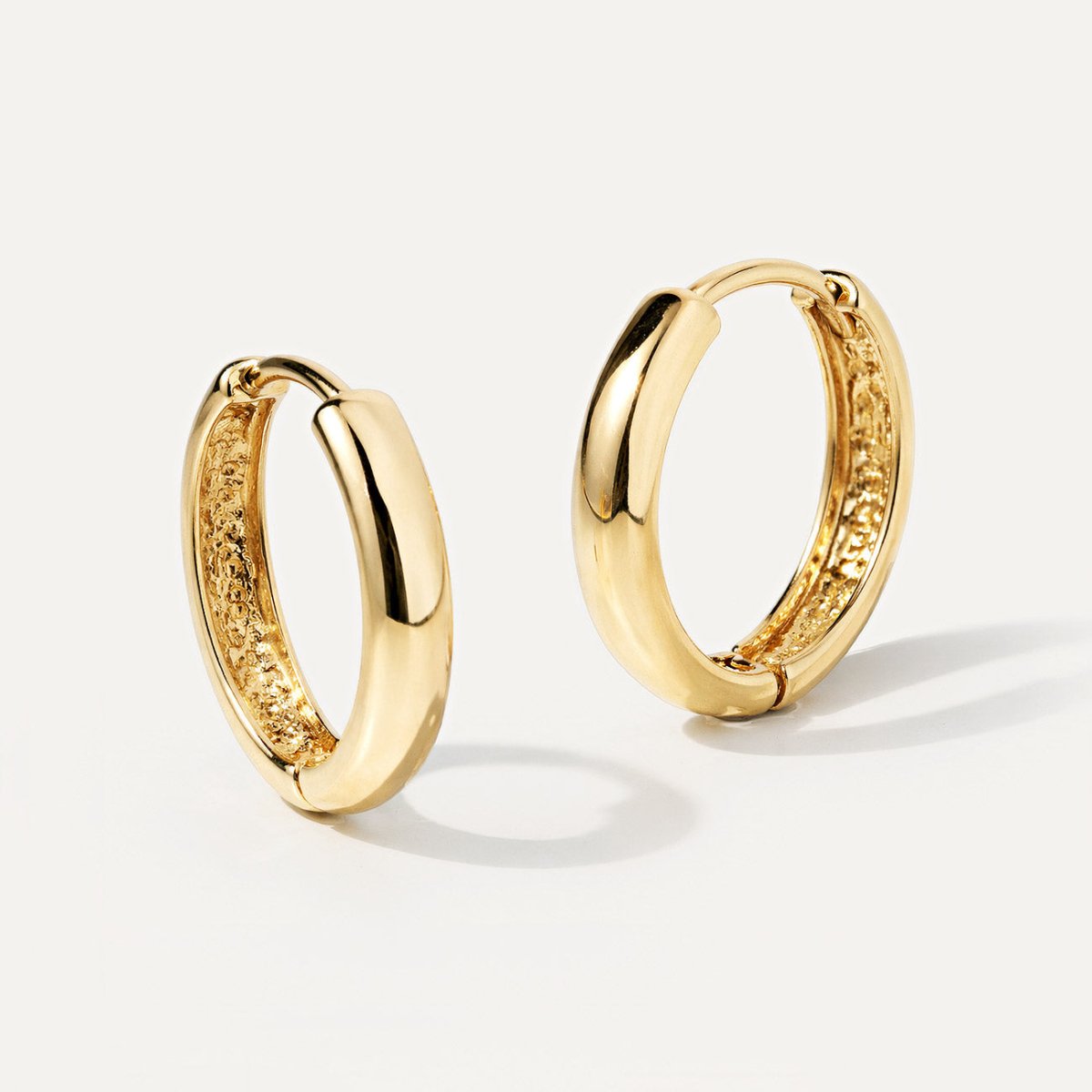 Pair of bestselling 14k Gold boyfriend hoop earrings with 12mm inner diameter from AMYO