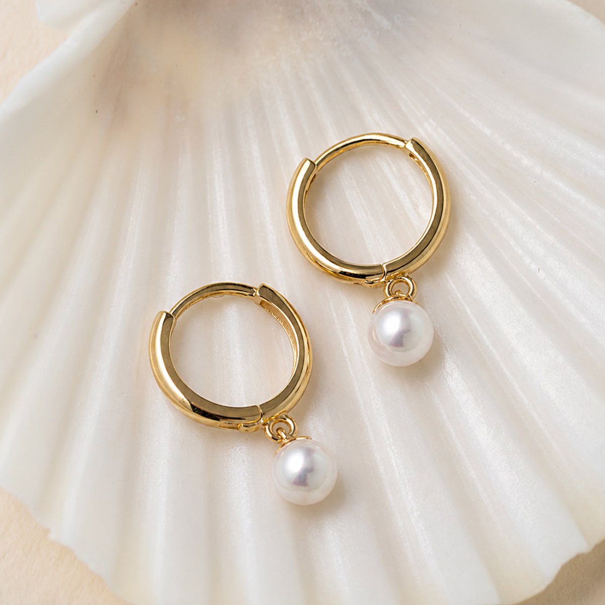 Tiny Pearl Huggies 14K