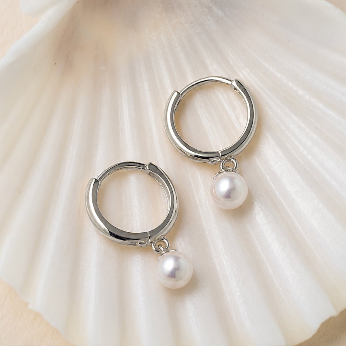 Tiny Pearl Huggies 14K