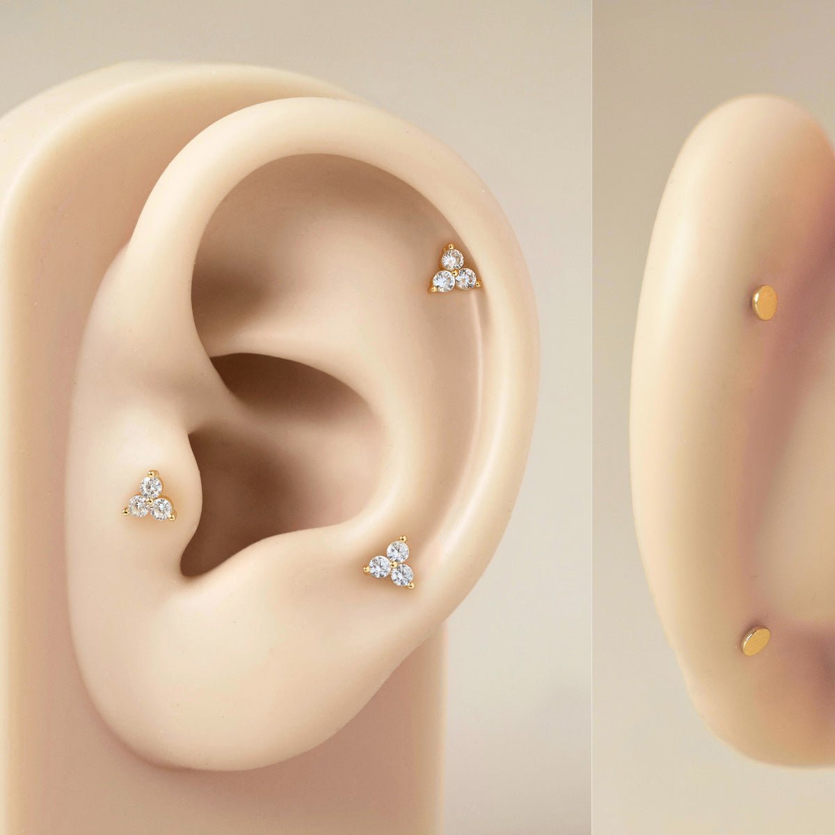 Silicone ear model showcasing AMYO Tiny Clover Crystal Flat Back Studs, illustrating how the studs can be worn on the upper lobe and cartilage.