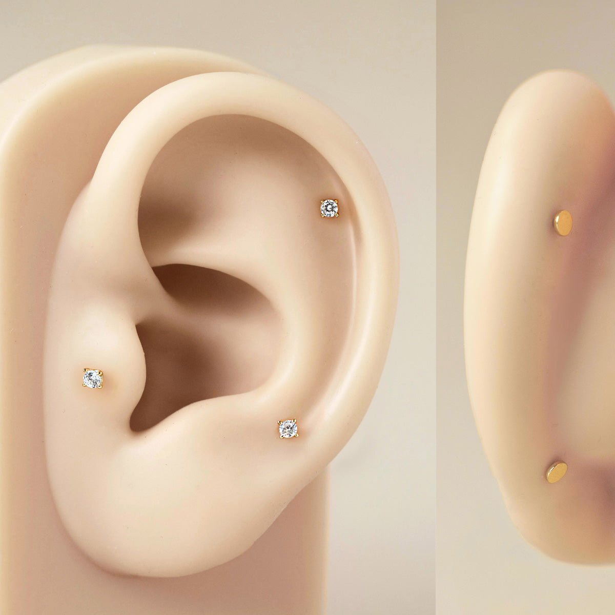 AMYO Tiny Crystal Flat Back Studs worn on silicone ear model, showing size and placement on upper lobe and cartilage.