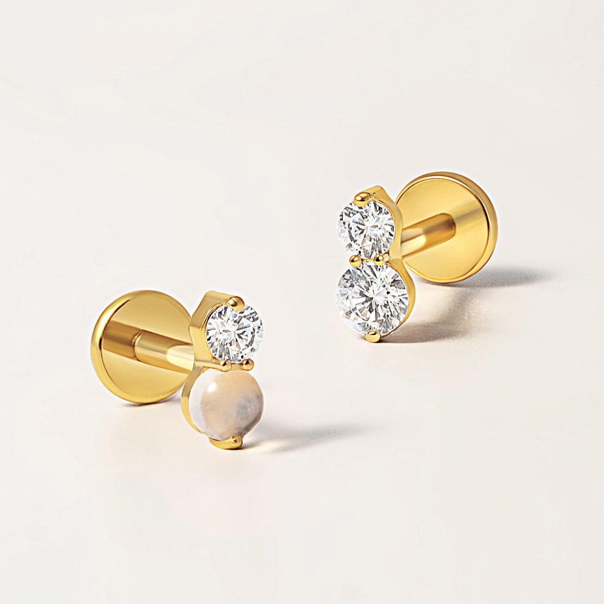 Detailed shot of  AMYO's Tiny Pavé Duo Flat back Stud with White Zirconia and White Opal gemstones.
