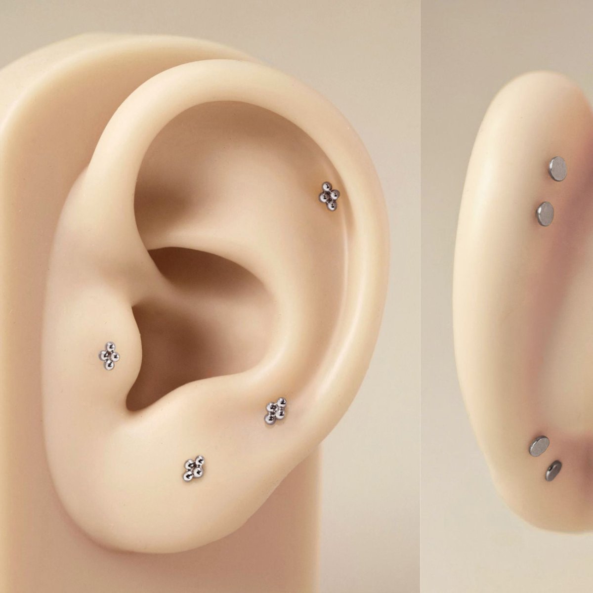 Titanium tiny quad beaded flat back stud earring, shown on a silicone ear