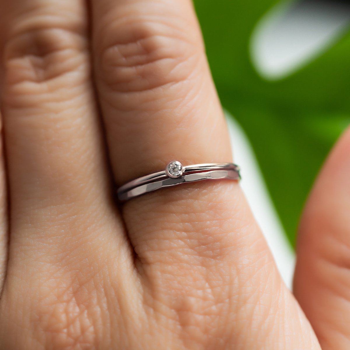 Sterling Silver ring set from AMYO made up with a small crystal solitaire band with a hammered ring.
