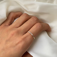 Dainty Sterling Silver Baguette Ring worn on Index Finger