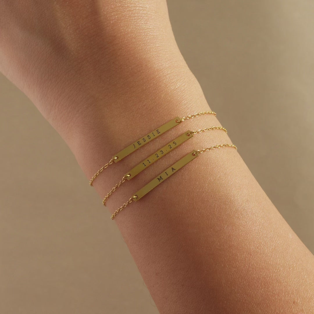 Video showcasing AMYO's Thin Bar Initial bracelets