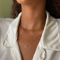 Model wearing Love Knot and Gold Chain Layered Set 