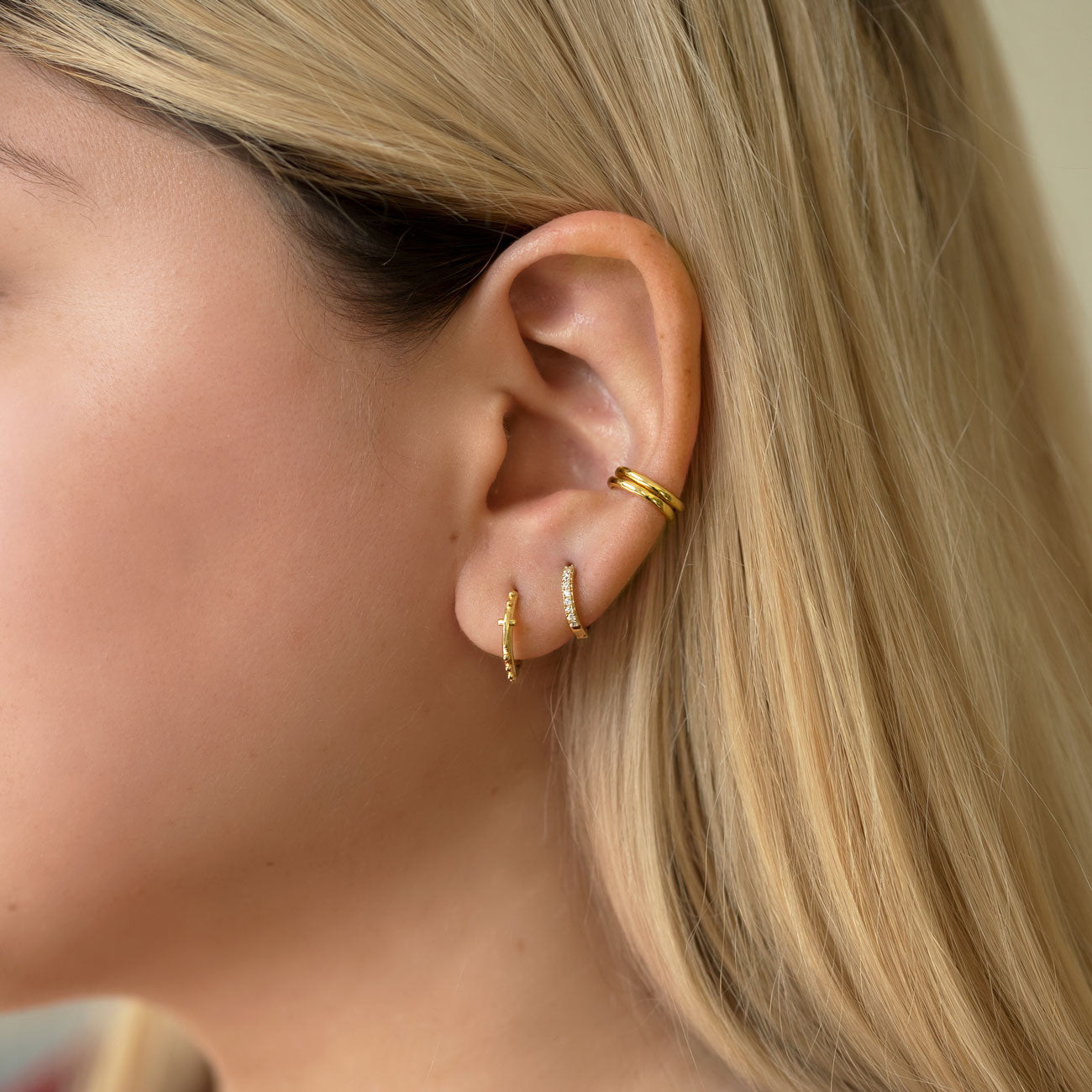 Gold Vermeil Curated Ear with Cross Bead Hoops, Pave Huggie Earrings and Eternity Ear Cuffs