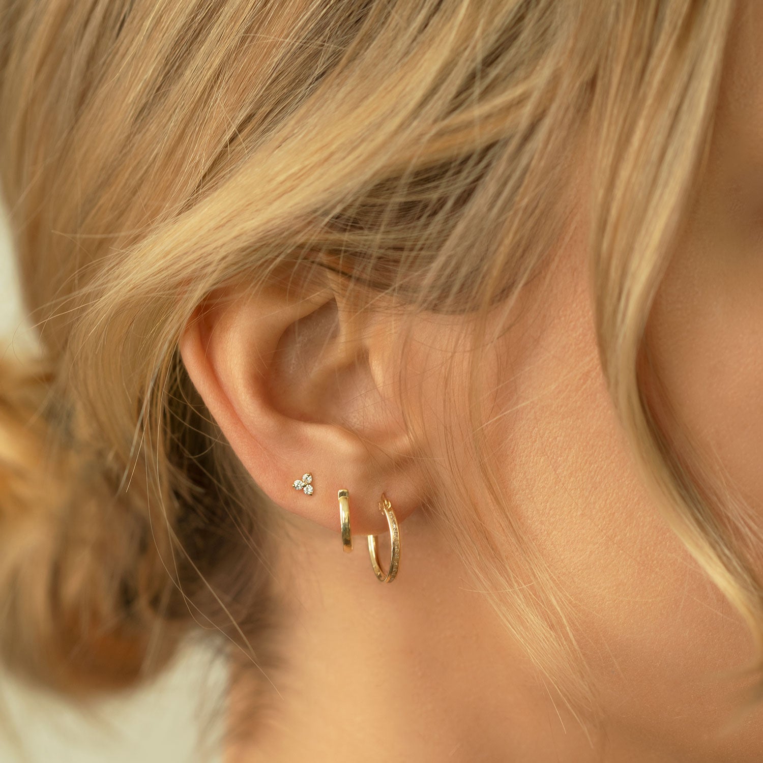 caption: Model wearing 6.5mm on second hole