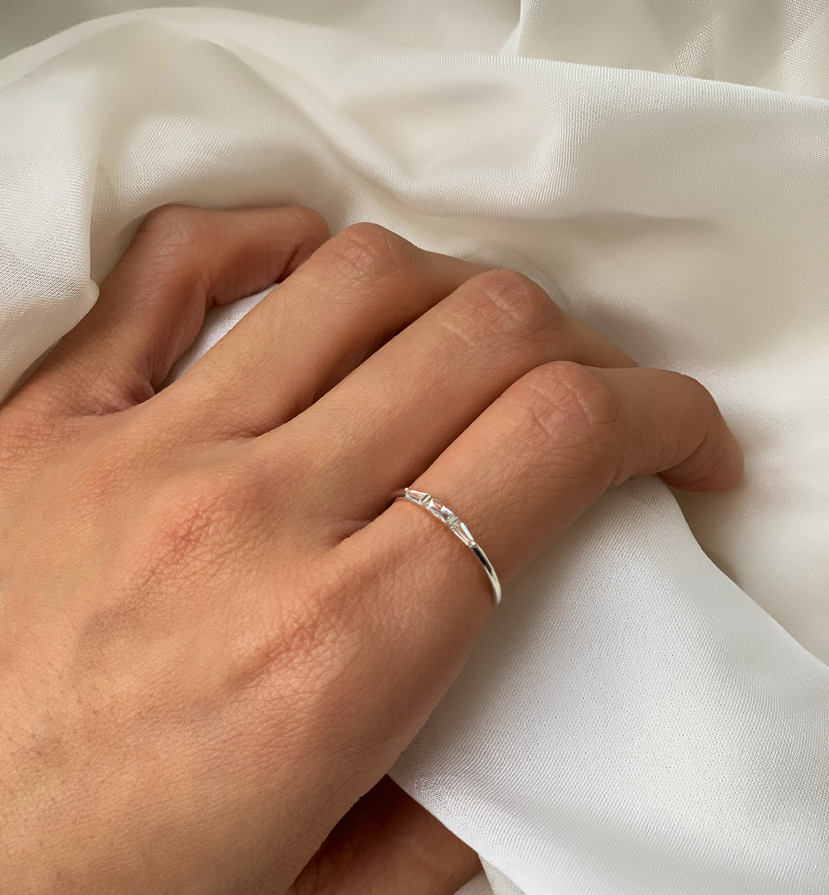 Dainty Sterling Silver Baguette Ring worn on Index Finger